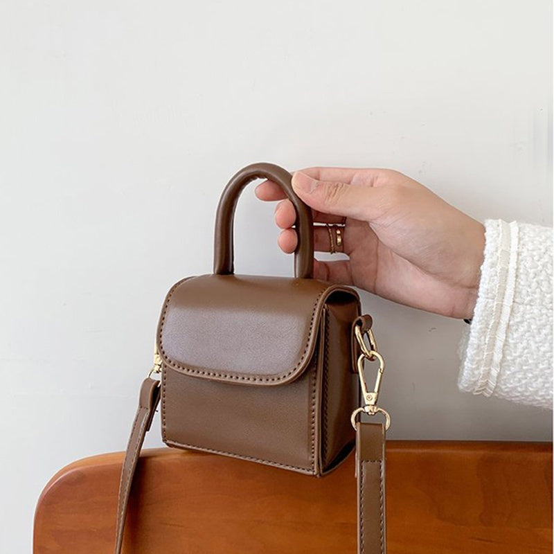 IELGY versatile fashion compact solid color magnetic buckle shoulder bag women