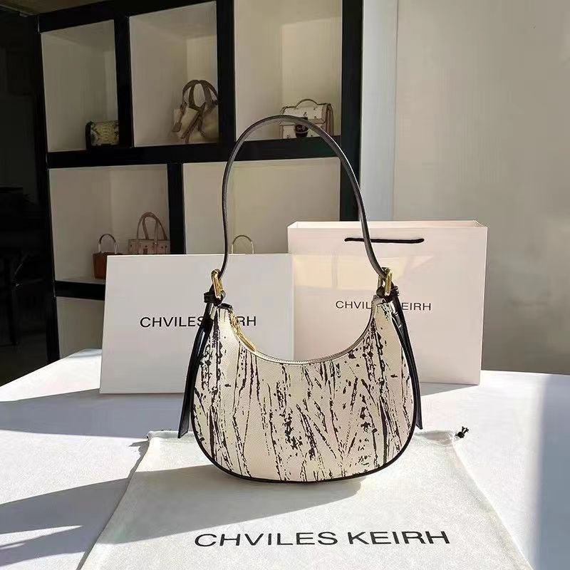 IELGY handbag female niche design high-end baguette armpit crescent bag