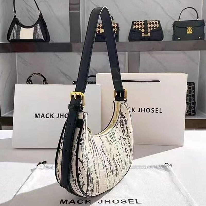 IELGY handbag female niche design high-end baguette armpit crescent bag