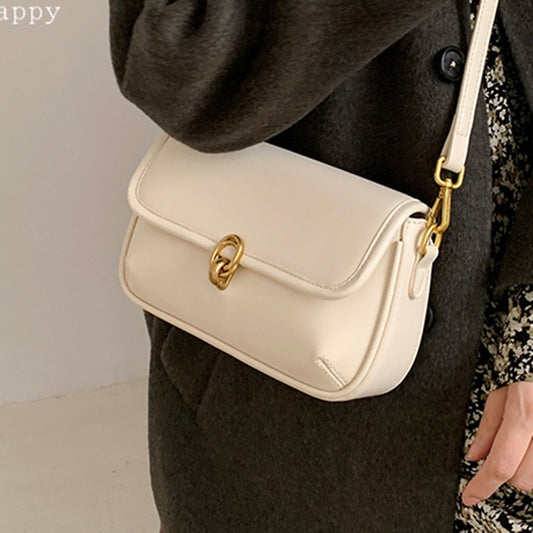 IELGY handbag women's retro armpit niche design high-end lock bag baguette