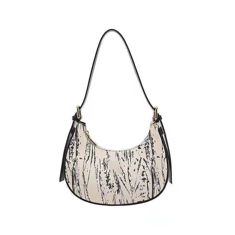 IELGY handbag female niche design high-end baguette armpit crescent bag