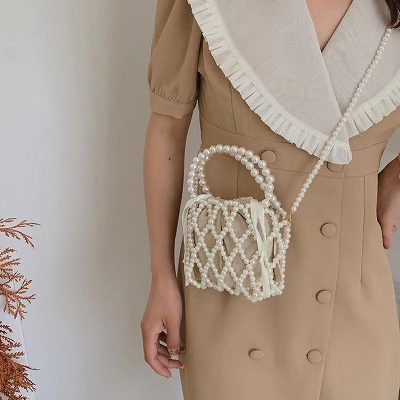 IELGY French Retro Fairy Bag Woven Beaded Bucket Bag Portable Crossbody Bag Summer Xiaozhong Design Hollow Pearl Bag