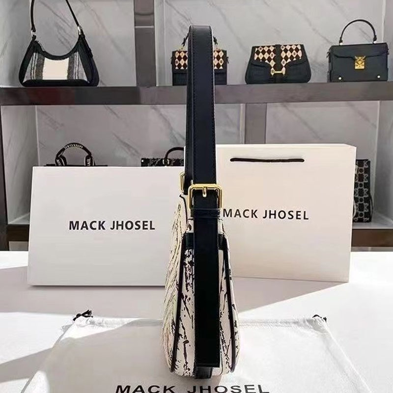 IELGY handbag female niche design high-end baguette armpit crescent bag
