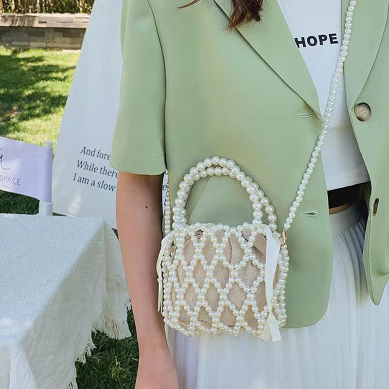 IELGY French Retro Fairy Bag Woven Beaded Bucket Bag Portable Crossbody Bag Summer Xiaozhong Design Hollow Pearl Bag