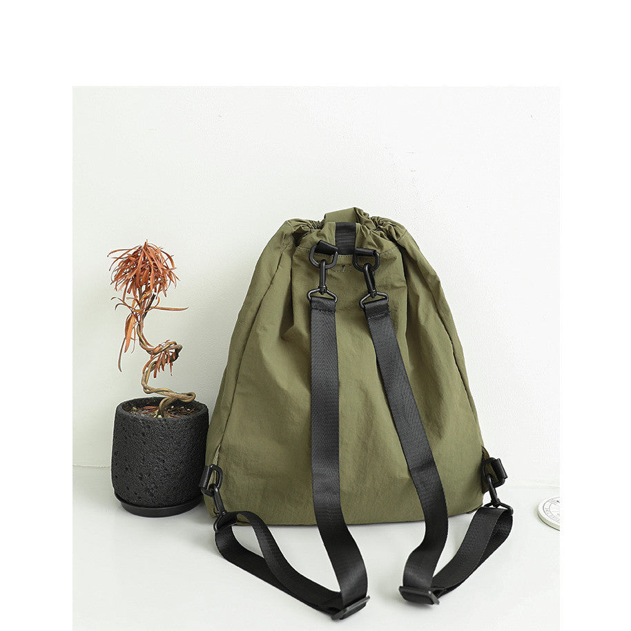 Ielgy Korean Version Casual Literary Canvas Backpack Fashion Nylon Large Capacity School Bag Drawstring Pleated Backpack