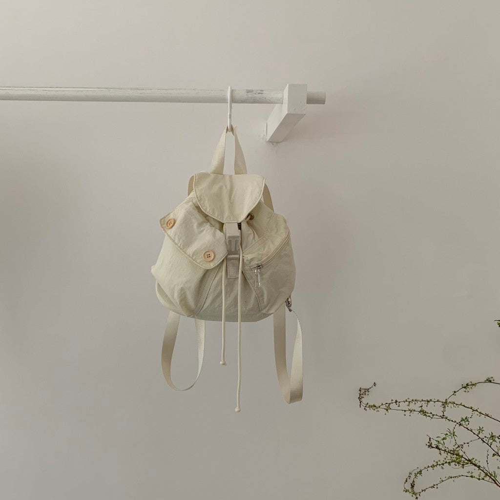 Ielgy New Style Korean Niche Design Outdoor Pocket Button Drawstring Backpack Nylon Backpack