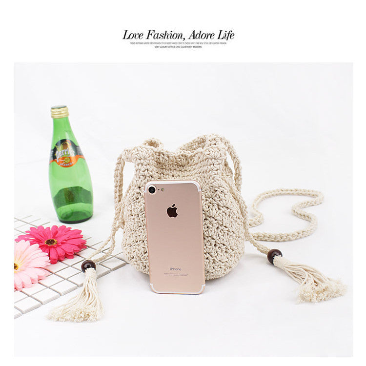 Ielgy Korean Version Cotton Thread Tassel Drawstring Bucket Bag Simple Straw Beach One-Shoulder Woven Mini Messenger Female Bag