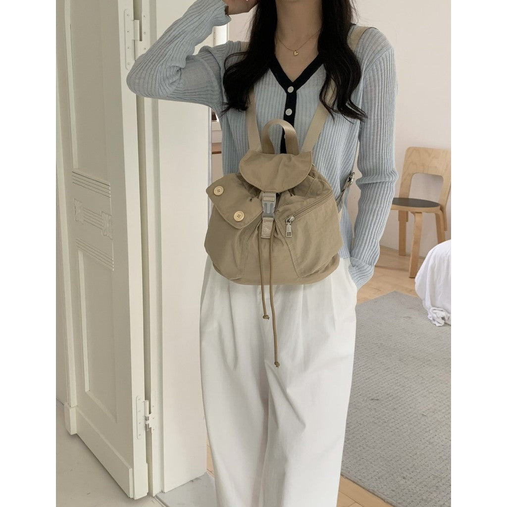 Ielgy New Style Korean Niche Design Outdoor Pocket Button Drawstring Backpack Nylon Backpack