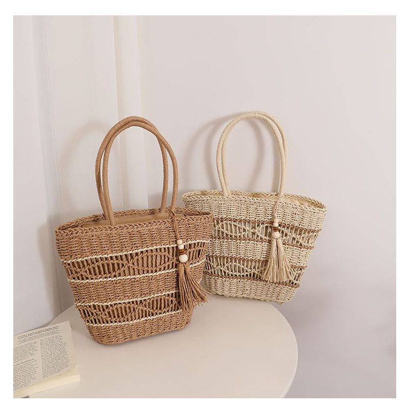 Ielgy Fashion Hollow One-Shoulder Straw Bag Tassel Portable Woven Holiday Style Beach Female Bag