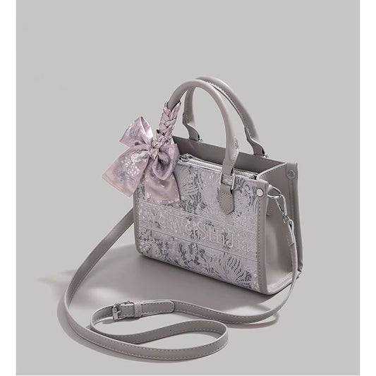 Ielgy Commuter Tote Bag High-End Pattern Embroidery Portable One-Shoulder Diagonal Shopping Bag (Ribbon Style Random Shipping)
