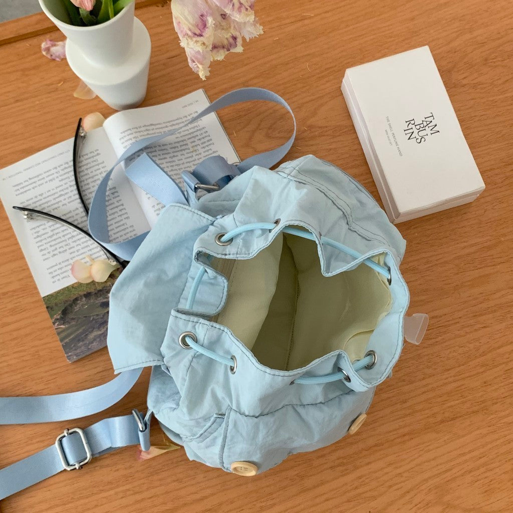 Ielgy New Style Korean Niche Design Outdoor Pocket Button Drawstring Backpack Nylon Backpack