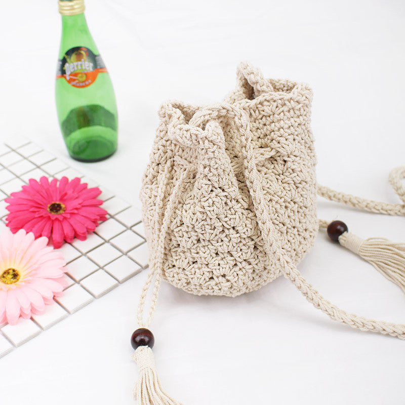 Ielgy Korean Version Cotton Thread Tassel Drawstring Bucket Bag Simple Straw Beach One-Shoulder Woven Mini Messenger Female Bag