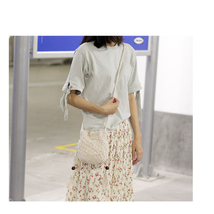 Ielgy Korean Version Cotton Thread Tassel Drawstring Bucket Bag Simple Straw Beach One-Shoulder Woven Mini Messenger Female Bag