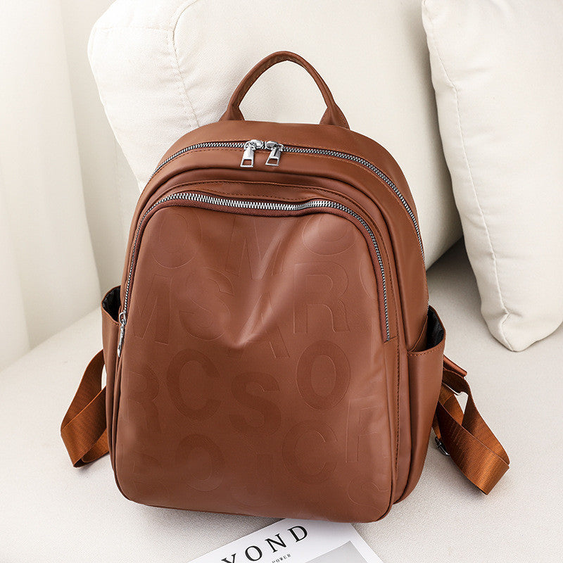 Ielgy Ladies PU Soft Leather Texture Backpack Fashion Letter Printing Travel Bag Simple Lightweight Commuter Bag