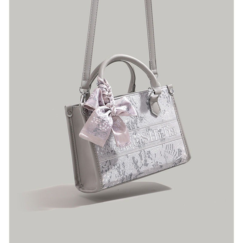 Ielgy Commuter Tote Bag High-End Pattern Embroidery Portable One-Shoulder Diagonal Shopping Bag (Ribbon Style Random Shipping)