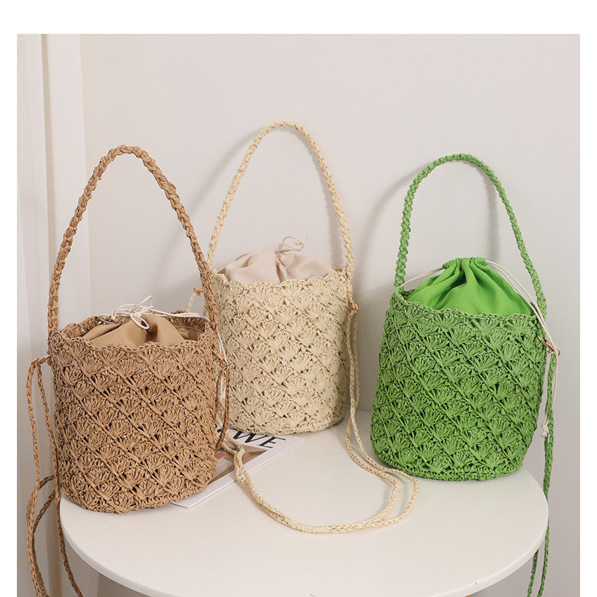 Ielgy Niche Design Straw Bucket Bag French Retro Crossbody Portable Woven Vacation Beach Bag