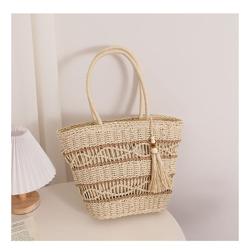 Ielgy Fashion Hollow One-Shoulder Straw Bag Tassel Portable Woven Holiday Style Beach Female Bag