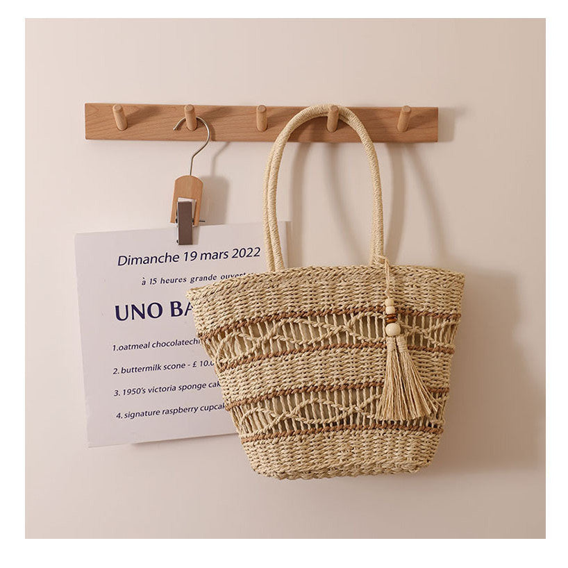 Ielgy Fashion Hollow One-Shoulder Straw Bag Tassel Portable Woven Holiday Style Beach Female Bag