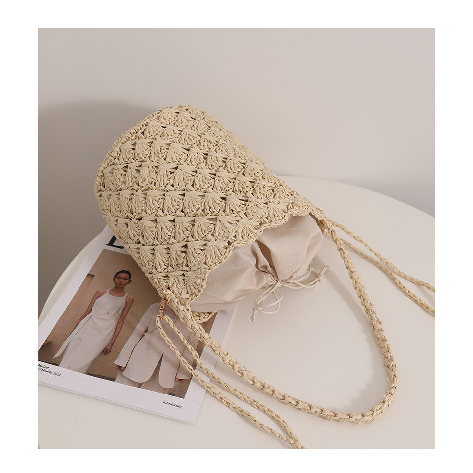 Ielgy Niche Design Straw Bucket Bag French Retro Crossbody Portable Woven Vacation Beach Bag