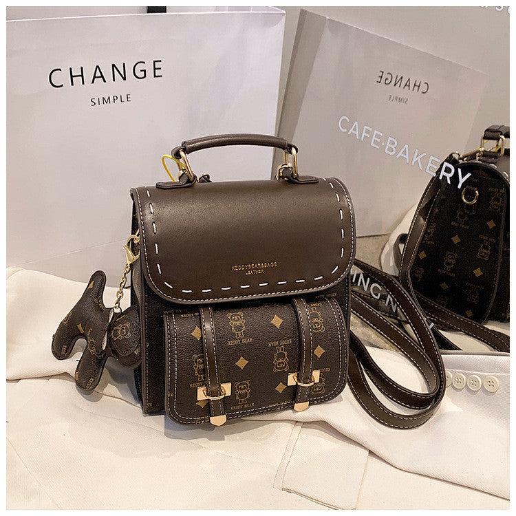 Ielgy Japanese Retro Fashion Backpack High-End Sense School Bag Texture Out Portable