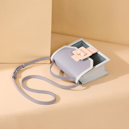 IELGY cross-body summer vitality High-class sense jelly bag fashion western style portable generous button exquisite style contrast color