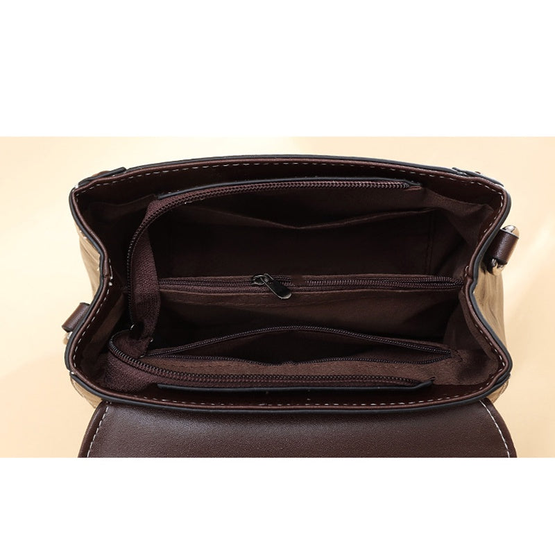 IELGY fashion wear-resistant rivet messenger handbag retro