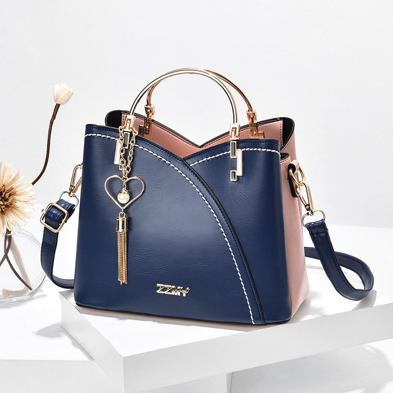 IELGY trendy metal letters large-capacity fashion accessories color-blocking messenger bag