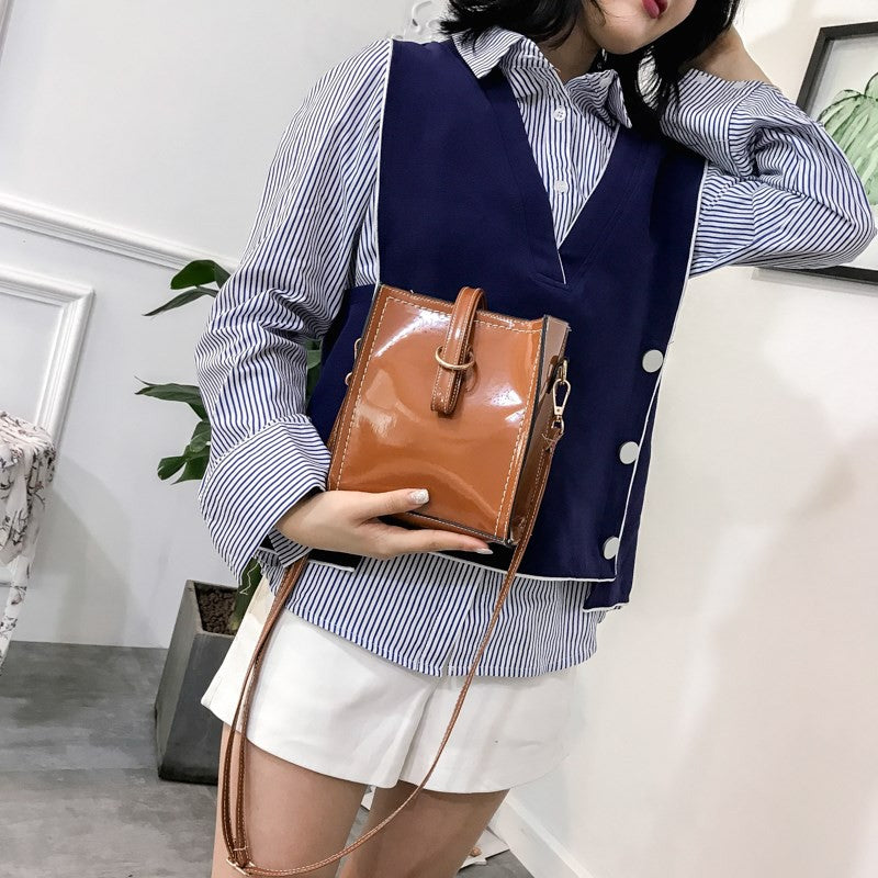 Glossy retro messenger bag