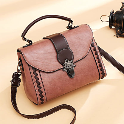 IELGY fashion wear-resistant rivet messenger handbag retro