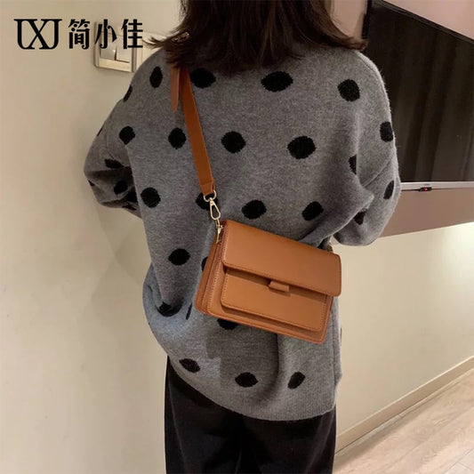 IELGY  Small square bag Messenger bag female simple retro bag senior sense of the wind and wind