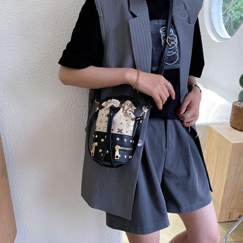 IELGY Women's bag bucket crossbody casual PU retro fashion rivet black all-match