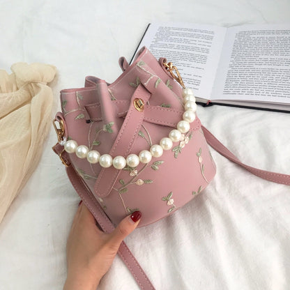 Small bag girl 2021 spring new fairy new lace embroidered bucket bag chain pearl shoulder slant satchel
