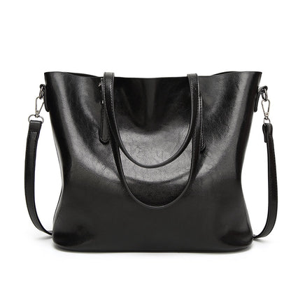 IELGY New spot handbags Simple shoulder slung women's bag