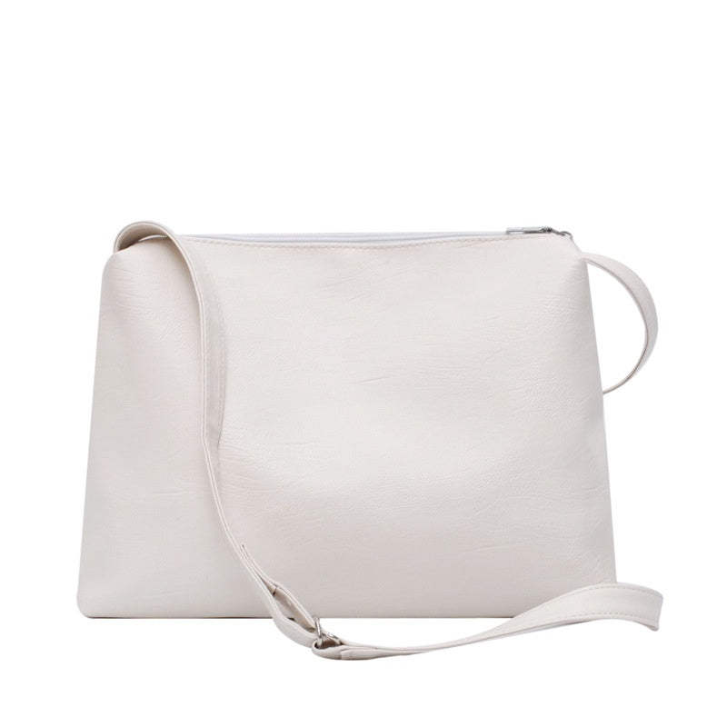 IELGY fashion versatile shoulder bag postman Korean version Hong Kong style large capacity cool messenger solid color