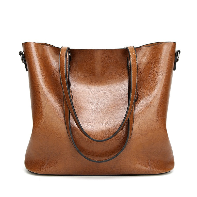 IELGY New spot handbags Simple shoulder slung women's bag