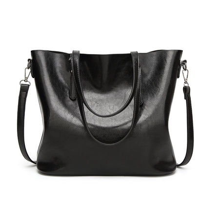 IELGY New spot handbags Simple shoulder slung women's bag