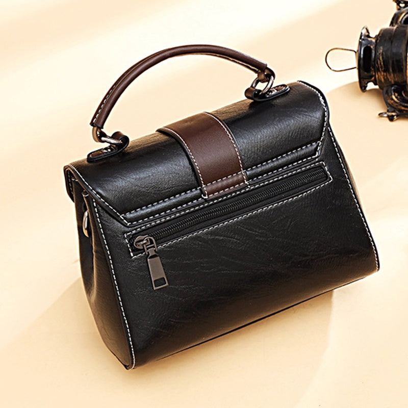 IELGY fashion wear-resistant rivet messenger handbag retro