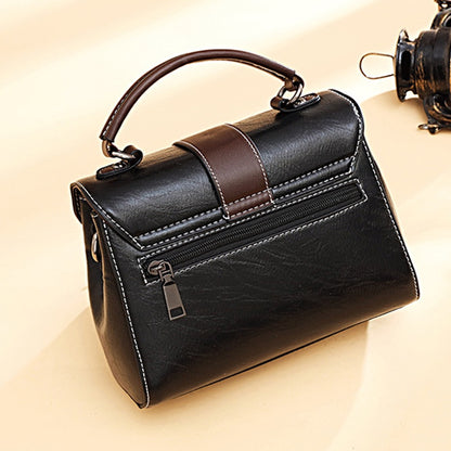IELGY fashion wear-resistant rivet messenger handbag retro