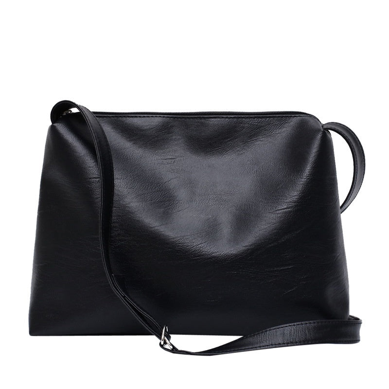 IELGY fashion versatile shoulder bag postman Korean version Hong Kong style large capacity cool messenger solid color