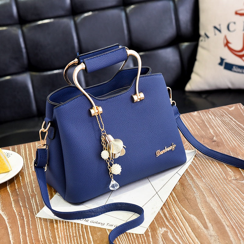 IELGY metal decoration elegant Korean style fashion stitching messenger large-capacity female bag
