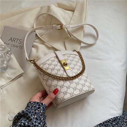 IELGY small pink retro niche design letter texture bucket messenger bag