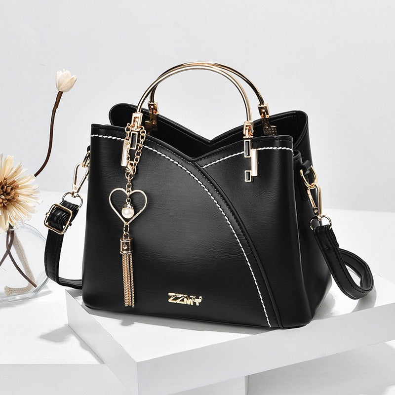 IELGY trendy metal letters large-capacity fashion accessories color-blocking messenger bag