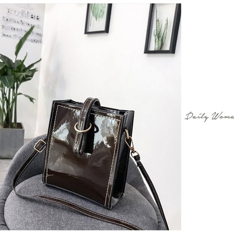 Glossy retro messenger bag