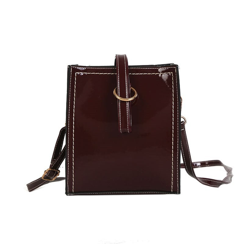 Glossy retro messenger bag