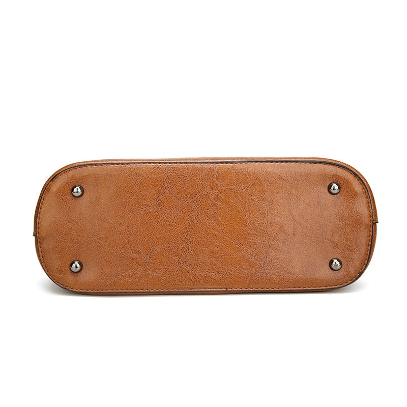 IELGY New spot handbags Simple shoulder slung women's bag