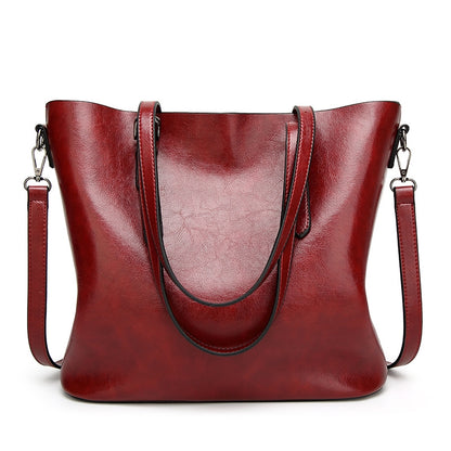 IELGY New spot handbags Simple shoulder slung women's bag