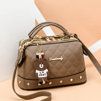 IELGY Korean style fashion rivet cartoon pendant messenger bag women