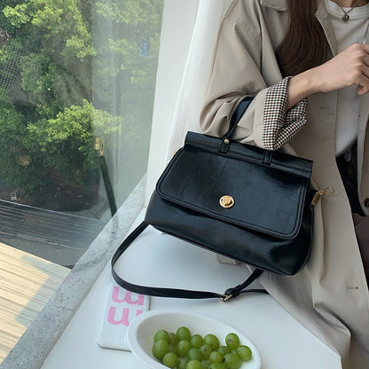 IELGY retro daily commuting large capacity texture messenger messenger bag women