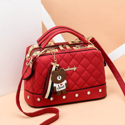 IELGY Korean style fashion rivet cartoon pendant messenger bag women
