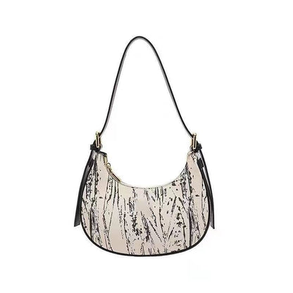 IELGY handbag female niche design high-end baguette armpit crescent bag